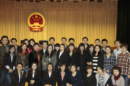 心怀公平正义践行庭审进步